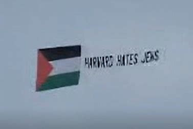 ‘Harvard Hates Jews’ banner flies above Cambridge campus as president comes under fire for Congressional testimony about antisemitism